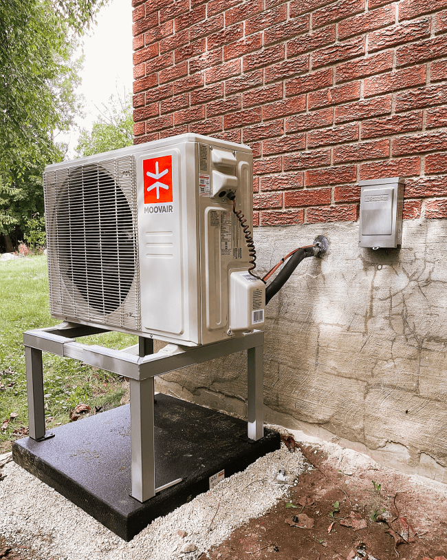 Heat Pump Condenser on a Snow Stand